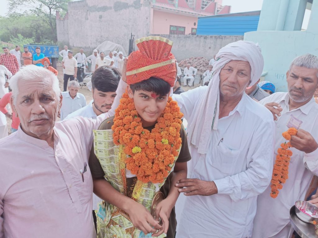 Gold Medal Lakshu and coach Deepak Dhankhar