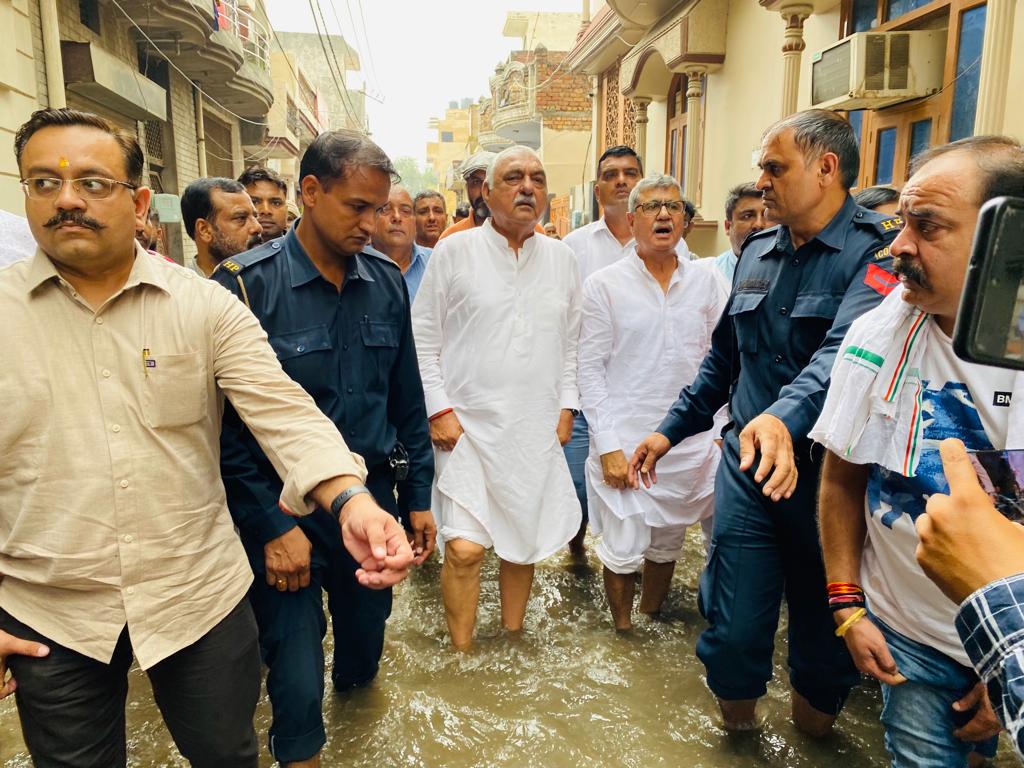 Hooda Reached to Take Stock of Rain