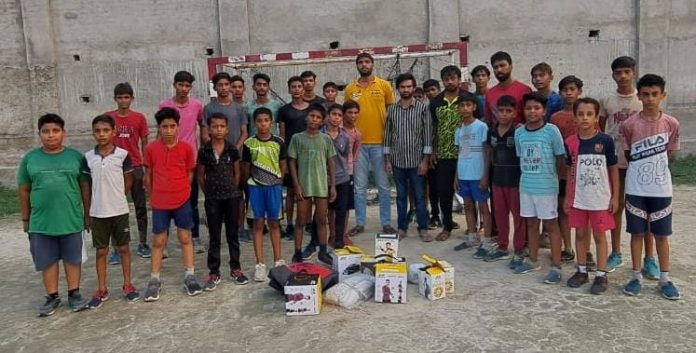 Panipat News/At handball ground in village Asan Kalan sporting goods distributed