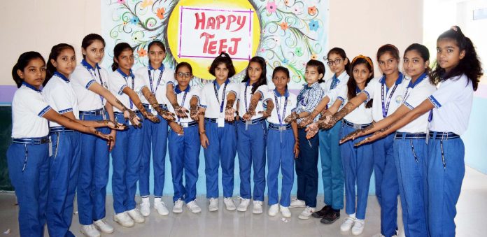 School Girls Engraved Mehndi on their Hands on Teej