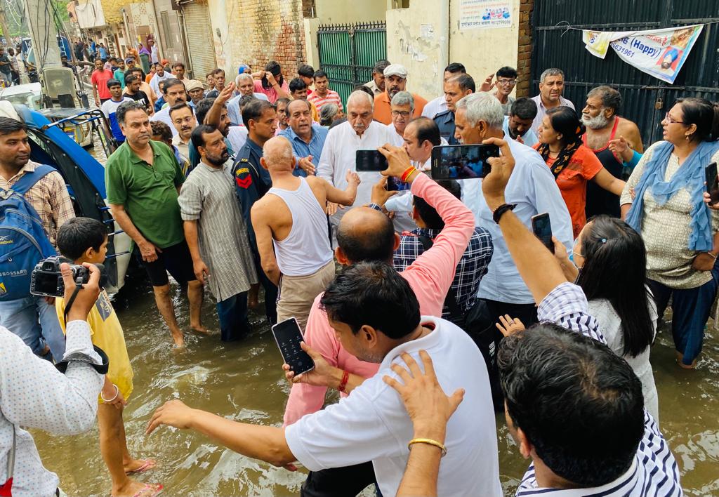 Hooda Reached to Take Stock of Rain