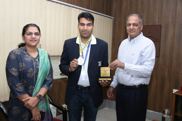 Academy's Anil Kumar won silver medal in Yoga