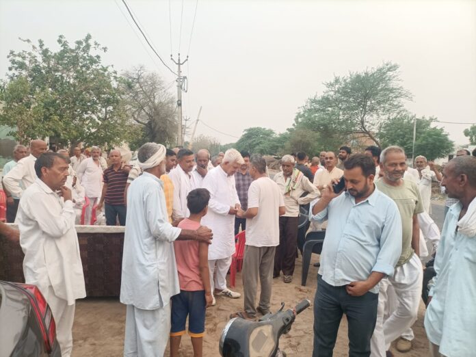 Former minister Satpal Sangwan listened to the problems of the villagers of Rankauli.