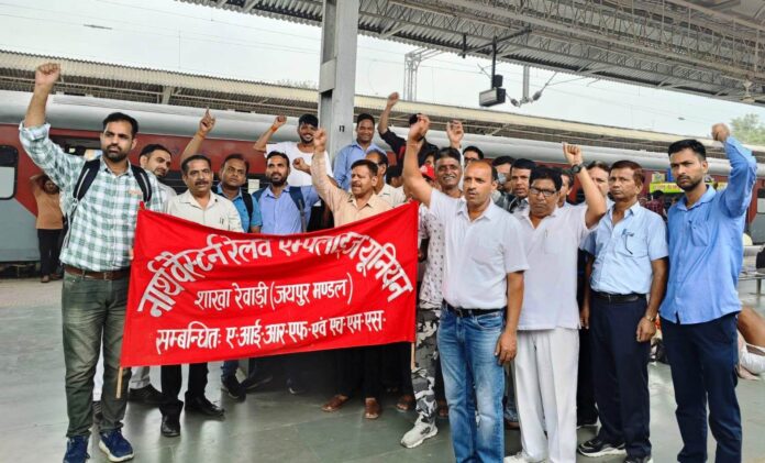 Remembering the martyrs of the railway strike, railway workers raised their voice and demanded restoration of old pension.