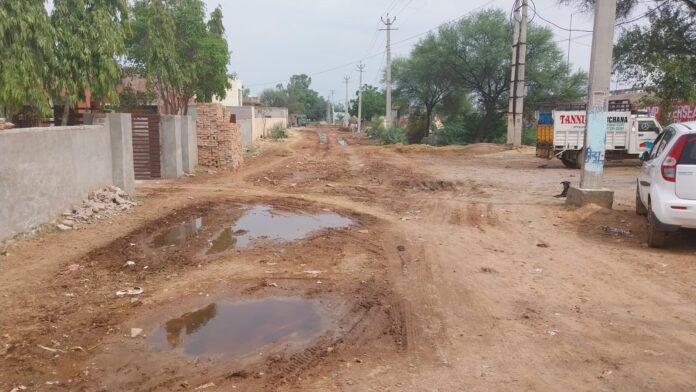 During the rainy season, the road leading to the Hafed godown turns into mud