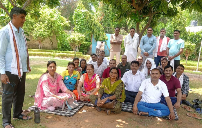 Physical teacher assistant and art teacher busy in preparing to gherao CM residence