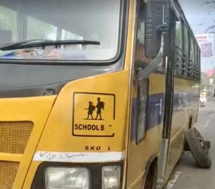 A tire of a bus taking children to school went flat