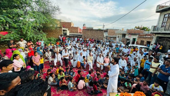 Congress leader Abhijit Lal Singh addressed the villagers in village Dhana Narsan