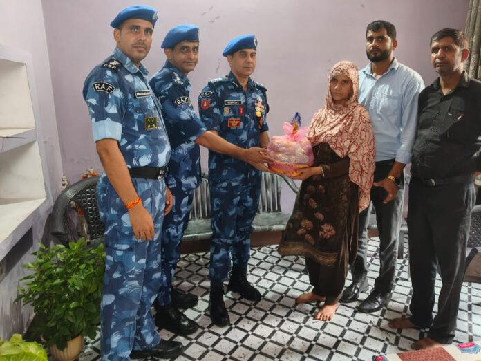 RAF personnel met the relatives of the martyr