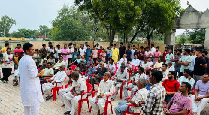 National Secretary of Youth Congress Dheeraj Singh addressed the villagers in village Barala