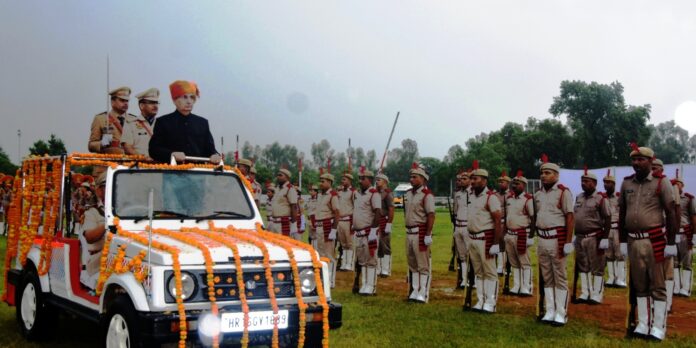 Amidst heavy rains, DC Mahavir Kaushik hoisted the tricolor at the local Bhim Sports Complex