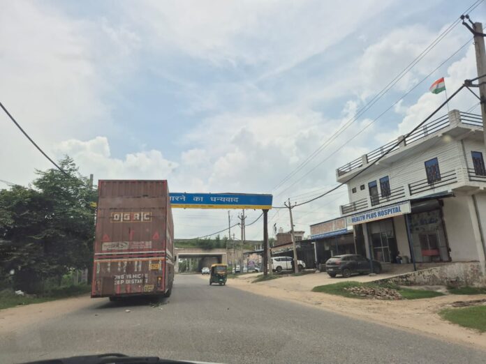 Standing in the middle of the road near the railway crossing increased the trouble.