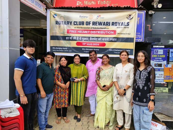 Two-wheeler drivers presented helmets as gifts to 60 sisters