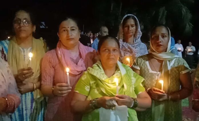 A candle march was taken out to express anger against the brutality