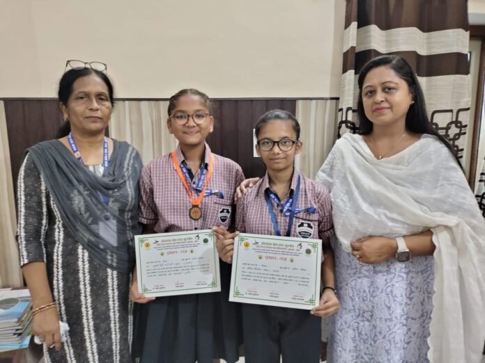 Kesar, a student of Sugni Devi School, got first place in the district level yoga competition.