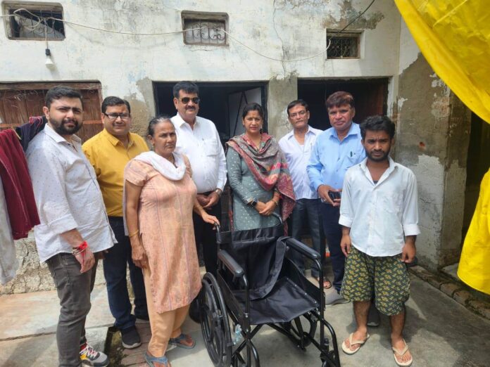 Rotary Club Rewari Royals provided a wheelchair to a needy woman under the wheelchair on demand program.