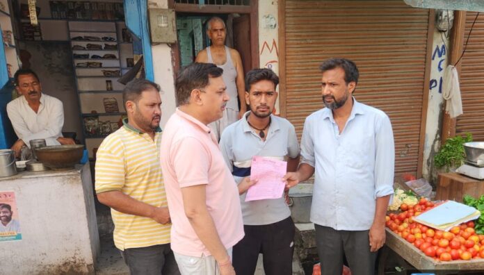 Deputy Corporation Commissioner inspected the door to door garbage collection system