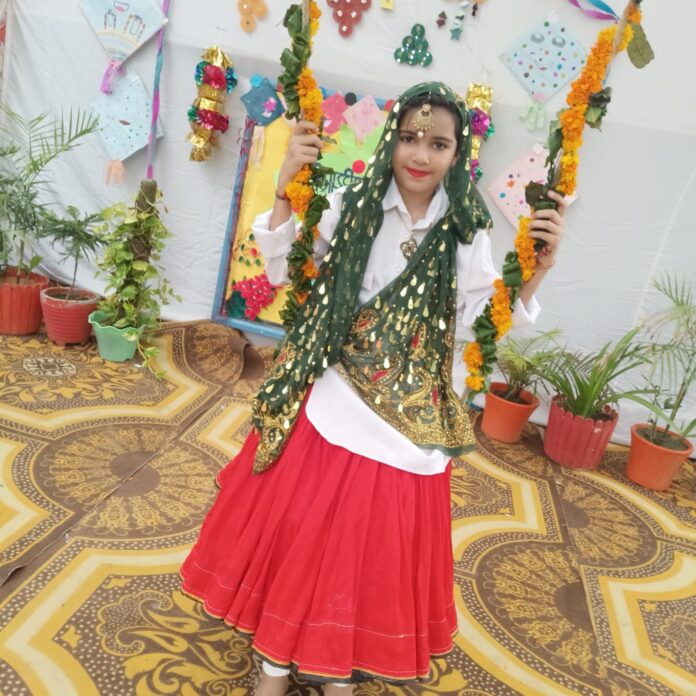 Children performed traditional songs at the Hariyali Teej reunion function