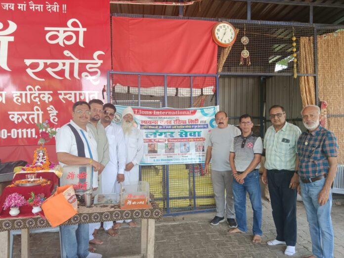 Lions Club Ratia City presented a tricycle to a handicapped person