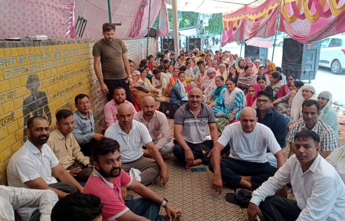 NHM employees shaved their heads to demand regularisation