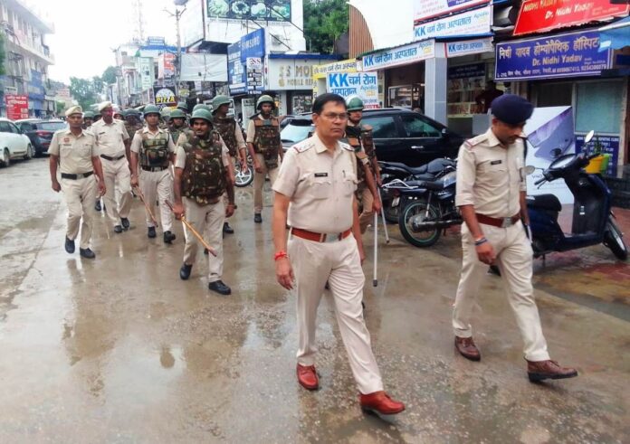 Police and RPF personnel took out a flag march in view of the assembly elections