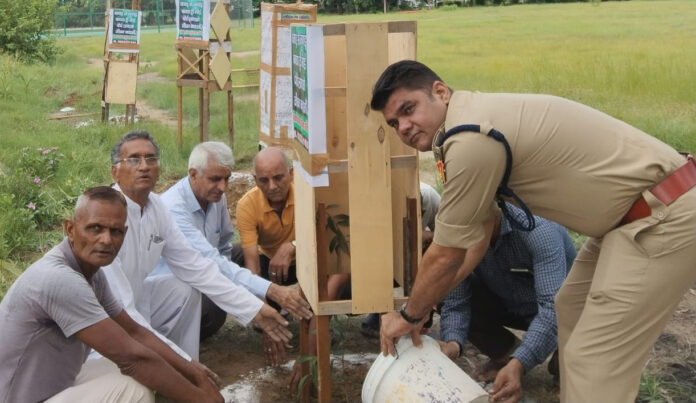 DSP planted five saplings and installed tree guards in the police line.