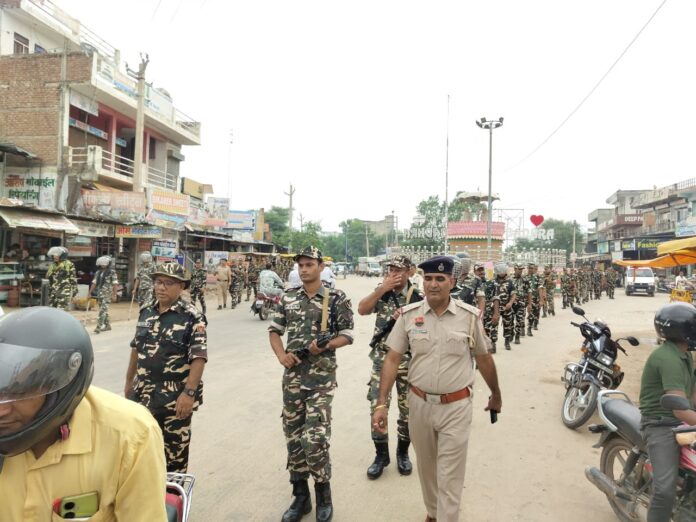 Police and paramilitary forces team march past