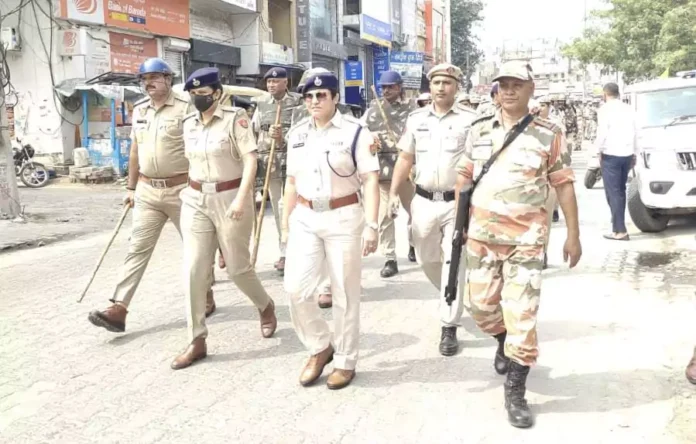 A flag march was taken out to appeal to the general public to vote without any fear