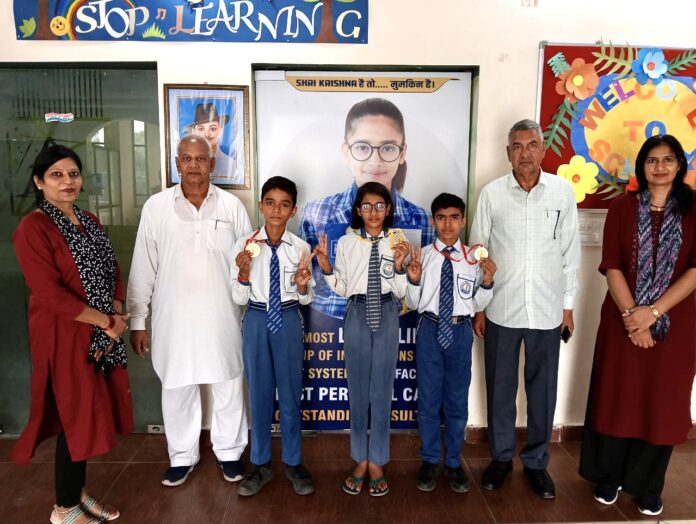 Students of Sri Krishna School Sihama won medals in the district level yoga sports competition