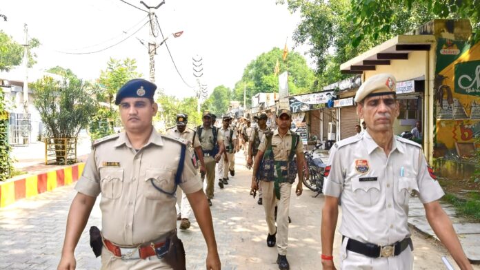 Police and RPF personnel took out a flag march in Kanina area regarding the assembly elections