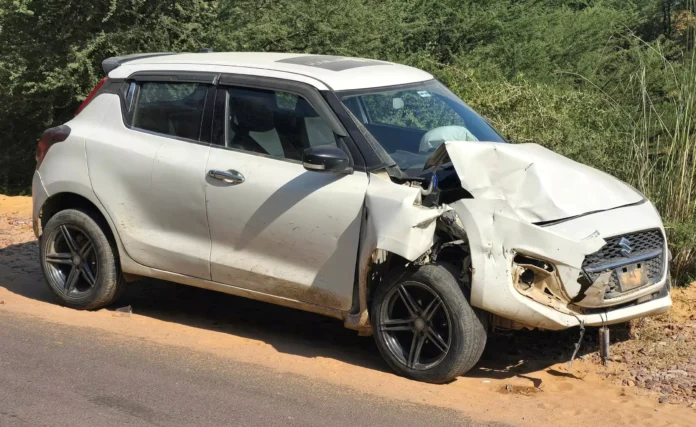 A car and a pick-up vehicle collided at a narrow turn in the valley of Madhogarh