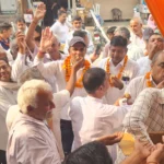 BJP workers expressed happiness by distributing laddus to celebrate the victory of Naib Singh Saini.