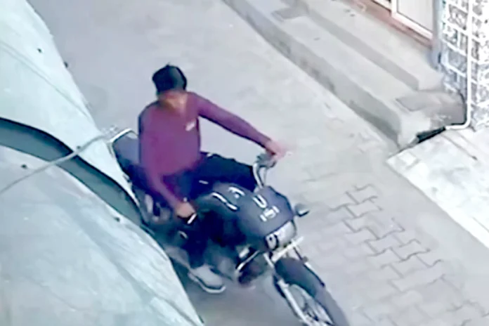 Bike parked outside the house stolen, thief caught on CCTV camera