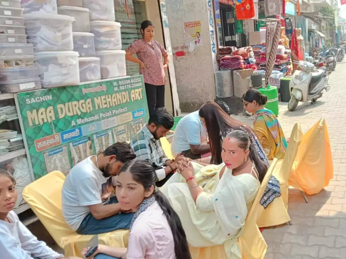 -Crowd of women in the main market on the occasion of Karva Chauth festival