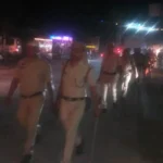 In view of the state elections, police and RPF personnel took out a flag march.