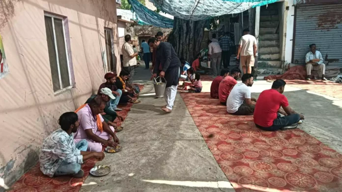 Organizing a feast on the occasion of Durgashtami at Santoshi Mata Temple