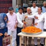 Saini community celebrated by playing drums and distributing jalebi on Naib Saini becoming CM again.