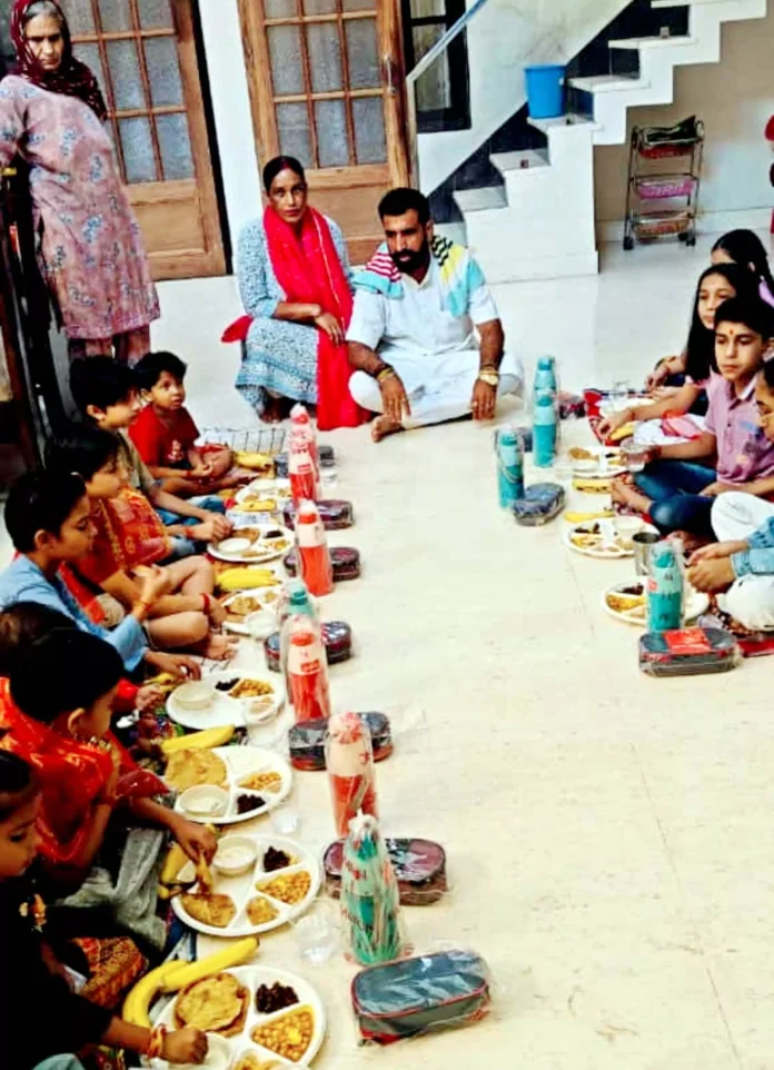 The devotees ended their fast by feeding the girls