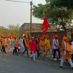 A huge flag march reached Shri Balaji Dham village Dobh