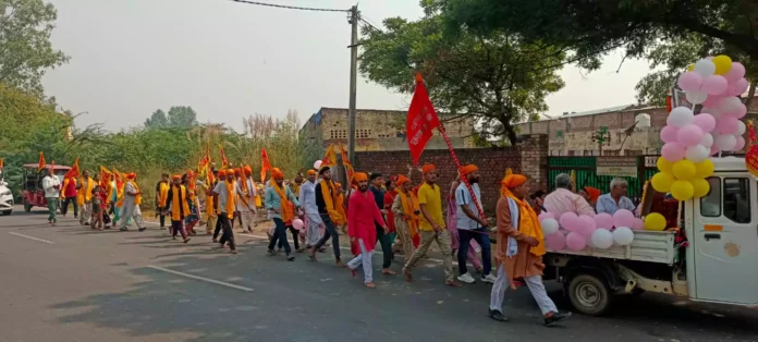 A huge flag march reached Shri Balaji Dham village Dobh