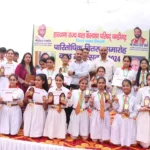 Students of Little Hearts hoisted the flag in the district level Children's Festival