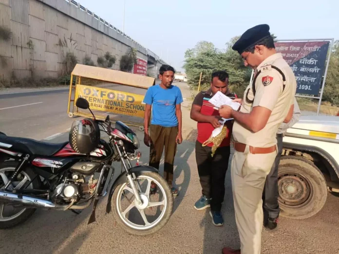 619 vehicles were checked and 131 were challaned and 9 were impounded