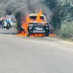 A moving car caught fire, family members had a narrow escape