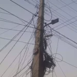 Electricity workers are getting entangled in the web of cables and internet wires on the poles