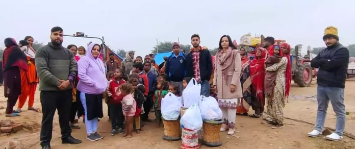 Food items distributed to the needy living in slums