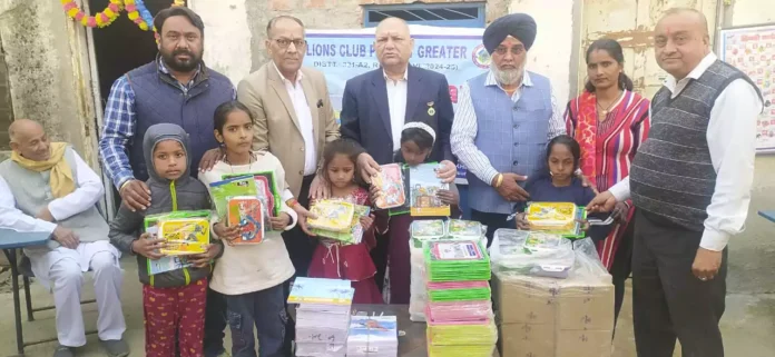 Lions Club distributed tiffin, copies and slate to 70 children of Chetna School.