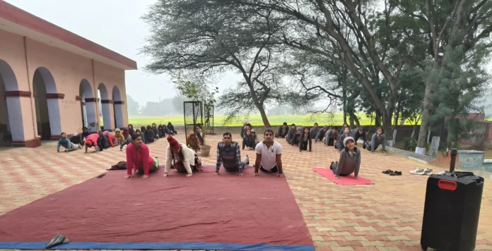 Children were made to do Surya Namaskar Yoga in Balali School.