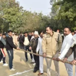 Tug of war competition organized by police department in village Sanwad